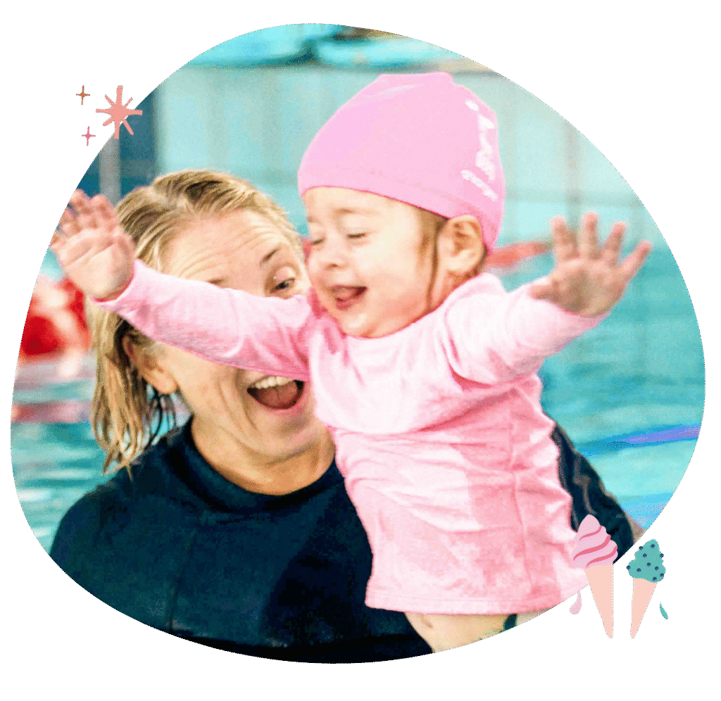 Happy toddler in baby swimming lesson at In The Deep Swim School, Kingsford Sydney